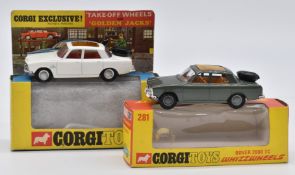 Two Corgi Toys diecast model Rover 2000 TC cars, one with white body, 'Take-Off Wheels' and '