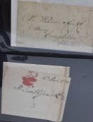 A folder of GB postal history from pre-stamp covers to QV including examples of LE and SP