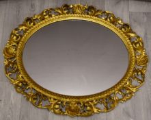 Royalcore ornate gilt framed mirror, 76 x 58cm overall