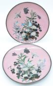 A pair of Japanese cloisonné enamel chargers decorated with birds, flowers and foliage, diameter