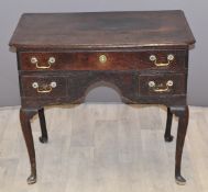 Georgian oak lowboy raised on cabriole legs, fitted three drawers, W77 x D48 x H71cm
