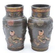 A pair of early 20thC Chinese relief moulded vases, H25.5cm