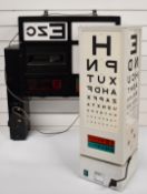 Optician's illuminated eye test 'oxo' sign, W57 x D25 x H47cm