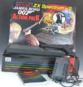 Sinclair ZX Spectrum +2 James Bond 007 Action Pack, in original box including power supply and light