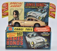Corgi Toys diecast model James Bond 007 Aston Martin DB5 with gold body, red interior, spoked hubs