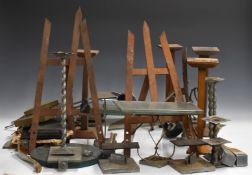 Vintage optician's shop display advertising stands, mostly to display spectacles/glasses but some