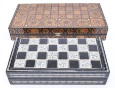 Eastern inlaid backgammon set together with another similar mother of pearl and abalone inlaid