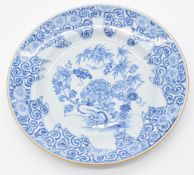 Chinese 19thC blue and white plate decorated with flowers and foliage, diameter 23cm