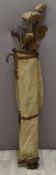 Vintage hickory shafted golf clubs in bag