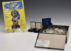 Collection of Robertson's Golly collector's badges and a reference book