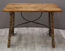 17th/18thC Italian elm/ walnut refectory table, the plank top raised on ornately carved trestle ends