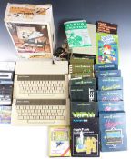 Two Acorn Electron computers together with a Plus 1 expansion, power supply, Music 500 Synthesiser