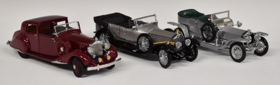 Three Franklin Mint diecast model Rolls Royce cars comprising 1925 Silver Ghost, 1907 The Silver