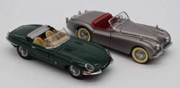 Two Franklin Mint diecast model Jaguar cars The 1949 XK120 and 1961 E-Type, both in original boxes.