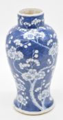 Chinese 19thC blue and white prunus vase with Kangxi character mark to base, H33cm