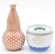 Japanese double gourd vase with iron stone red and gilt decoration and marks to base and a Chinese