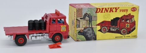 Dinky Toys diecast model Bedford TK Coal Lorry with red body, six coal bags and 'Hall & Co'