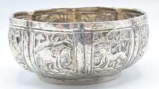 Indian or Burmese silver bowl with lobed embossed decoration of animals, diameter 9cm, weight 62g