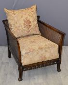 A 19th/20thC low bergère chair, W68cm