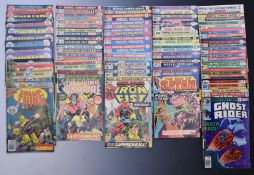 Fifty-five bronze age Marvel and DC comics comprising 13 issues of Ghost Rider, 10 issues of Iron