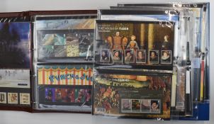 A collection of modern GB presentation packs in two folders, a box file and loose, high face value