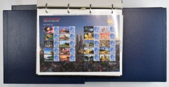 Approximately 230 GB presentation packs in six boxed binders and an album of GB Smiler sheets,