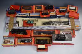 Nineteen Hornby and Tri-ang 00 gauge model railway locomotives, coaches, wagons and accessories