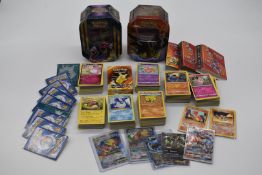 Over 800 Pokemon cards from a variety of decks including Sun & Moon, Evolutions, Guardians Rising,