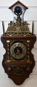 19thC style wall clock with pendulum to window below, H60cm