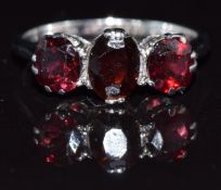 A 9ct gold brooch in the form of a greyhound with textured details, in original box, 6.8g, 6cm long