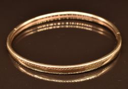 A 9ct gold bangle, 6.3g, 6 x 5cm