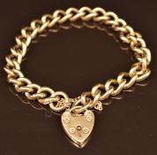 A 9ct gold curb link bracelet, 35.7g