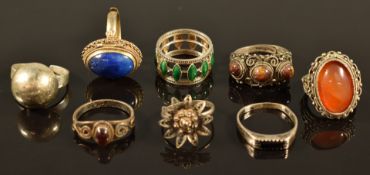 Seven silver rings including lapis lazuli, filigree, enamel, agate, etc