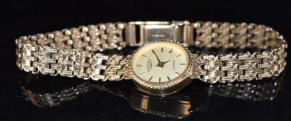 Rotary 9ct gold ladies wristwatch with gold hands, hour markers and dial and quartz movement, on 9ct