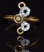 A 9k gold ring set with diamonds in a circular design, 2.8g, size M