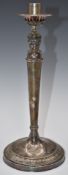 White metal figural candlestick with leaf decoration to base, marks indistinct but marked to base