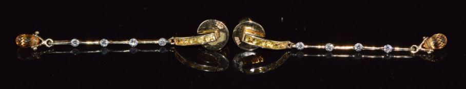 A pair of 18ct gold earrings set with yellow sapphires and diamonds, 3.5g