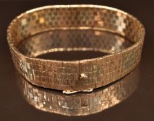 A 9ct bicoloured bracelet, 48.3g