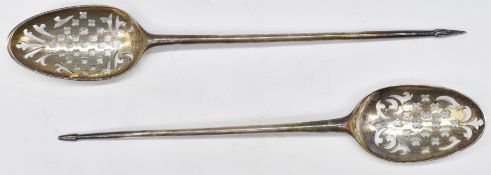 Two mid to late 18thC bottom hallmarked mote spoons, marks indistinct, one possibly London 1747,