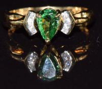 An 18ct gold ring set with green garnet and diamonds, 3.5g, size N