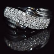 A 9k white gold ring set with diamonds, 7.8g, size M
