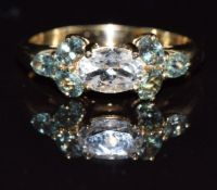 A 9k gold ring set with white topaz and alexandrite, 2.6g, size P
