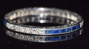 Art Deco platinum ring set with square cut sapphires and round cut diamonds, with decoration