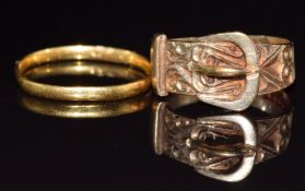 A 9ct gold buckle ring (3.7g, size P) and a 22ct gold wedding band / ring, 1.5g, size S