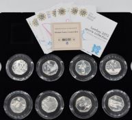 Eight Royal Mint London 2012 Olympic 50p coins, with certificates