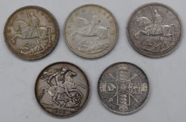 Four crowns comprising 1889 Jubilee head and three George V rocking horse examples, together with an