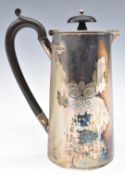 George V hallmarked silver hot water jug with hinged lid and plain tapering body, Sheffield 1912,