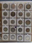 An album containing largely silver coinage to include Belgium and Switzerland, Greece and