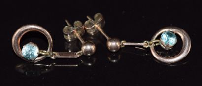 A pair of 9ct rose gold earrings set with a zircon to each, 3.3g