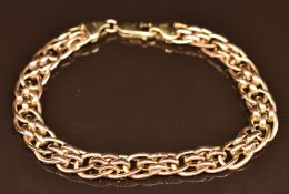 A 9ct gold bracelet made up of oval links, 19cm long, 8.9g